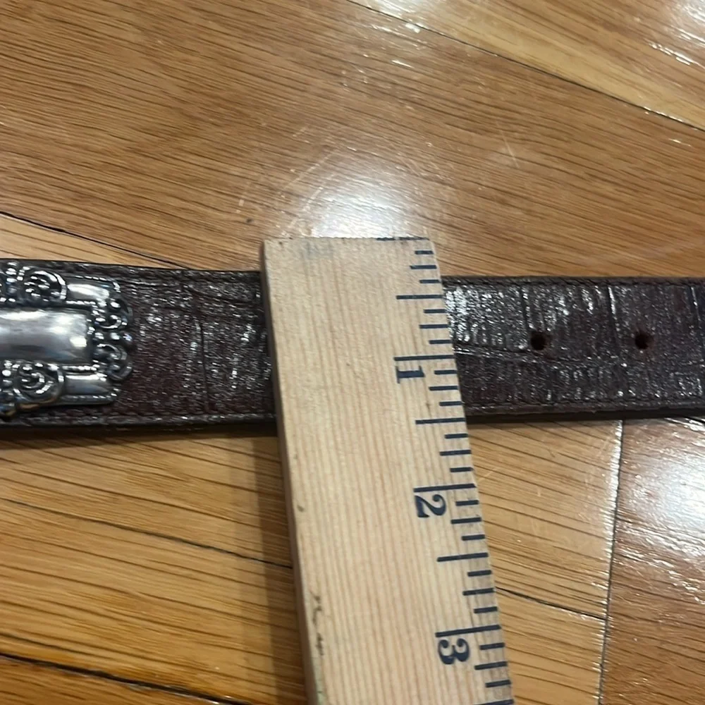 Brighton 1993 dark brown textured silver medallion accents belt size medium.